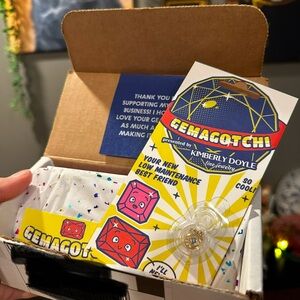 Kimberly Doyle Gemagotchi Tamagotchi Virtual Pet Toy Baby Size